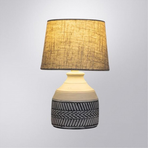 Фото Настольная лампа декоративная Arte Lamp Tiaki A4636LT-1GY
