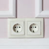 Фото Розетка влагозащищенная с заземлением, без рамки Werkel слоновая кость W1171103