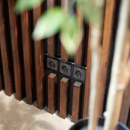 Фото Розетка с заземлением, без рамки Werkel графит рифленый W1171004